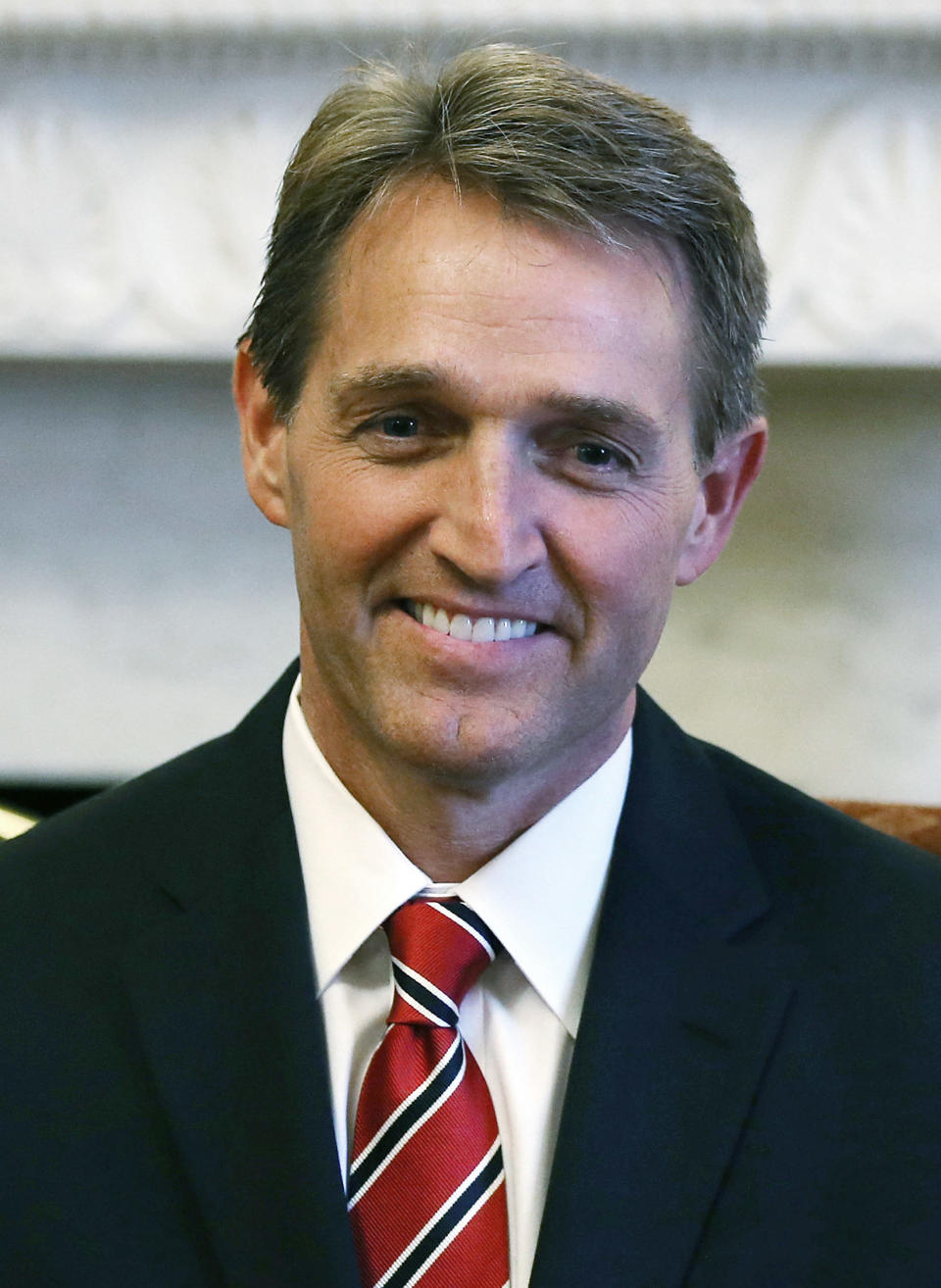 GOP senators-elect Jeff Flake (R-Ariz.), poses for a picture with Senate Minority Leader Mitch McConnell at the U.S. Capitol on November 13, 2012 in Washington, D.C. (Photo by Mark Wilson/Getty Images)