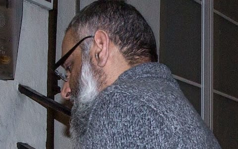 Anjem Choudary arriving at his probation hostel in North London - Credit:  Jeff Gilbert