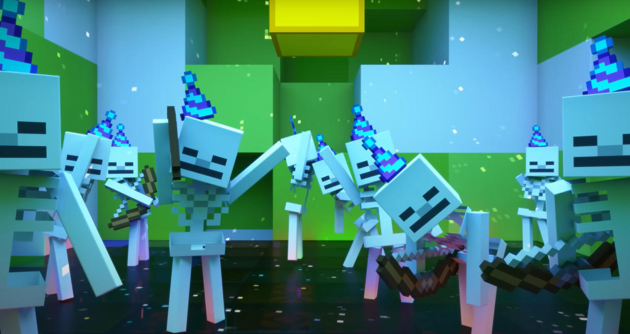  Skeletons dancing while wearing party hats . 