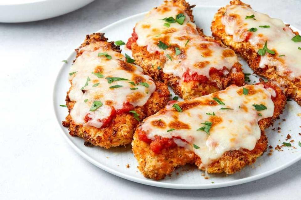 <p>Get your Italian-American restaurant favorite without all the fuss.</p><p><em><a href="https://www.delish.com/cooking/recipe-ideas/a35256979/air-fryer-chicken-parmesan-recipe/" rel="nofollow noopener" target="_blank" data-ylk="slk:Get the recipe from Delish »;elm:context_link;itc:0;sec:content-canvas" class="link ">Get the recipe from Delish »</a></em></p>