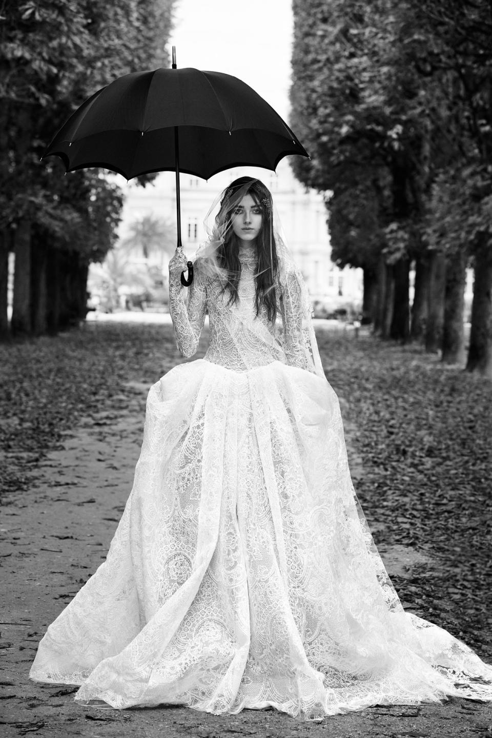 <p><i>Long-sleeve ball gown with macramé lace panels. (Photo: Courtesy of Vera Wang/Patrick Demarchelier) </i></p>