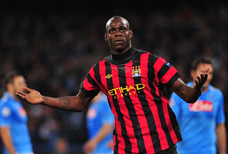 Manchester City's Italian forward Mario Balotelli celebrates after scoring during the Champions League group A football match SSC Napoli vs Manchester City on November 22, 2011 at the San Paolo stadium in Naples . AFP PHOTO / ALBERTO PIZZOLI (Photo credit should read ALBERTO PIZZOLI/AFP/Getty Images)