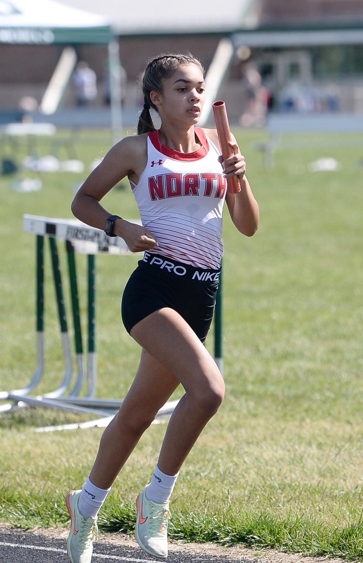 North Hagerstown's Rian Johnson runs the anchor leg of the girls 4x800 relay during the CMC Large School Outdoor Track & Field Championships at South Hagerstown. The Hubs won the race in 9:44.86.