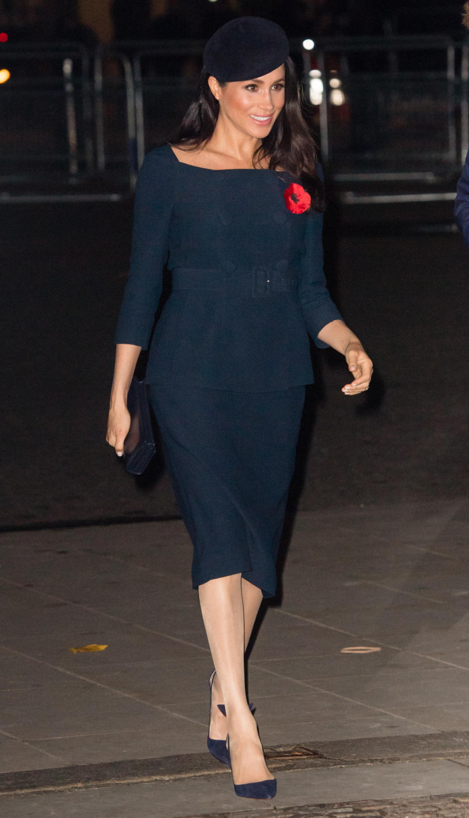 <p>Meghan chose a Stella McCartney coat and navy cold-shoulder co-ord for a Westminster Abbey service. She accessorised the look with a matching beret, Stella McCartney clutch and Manolo Blahnik heels. <em>[Photo: Getty]</em> </p>