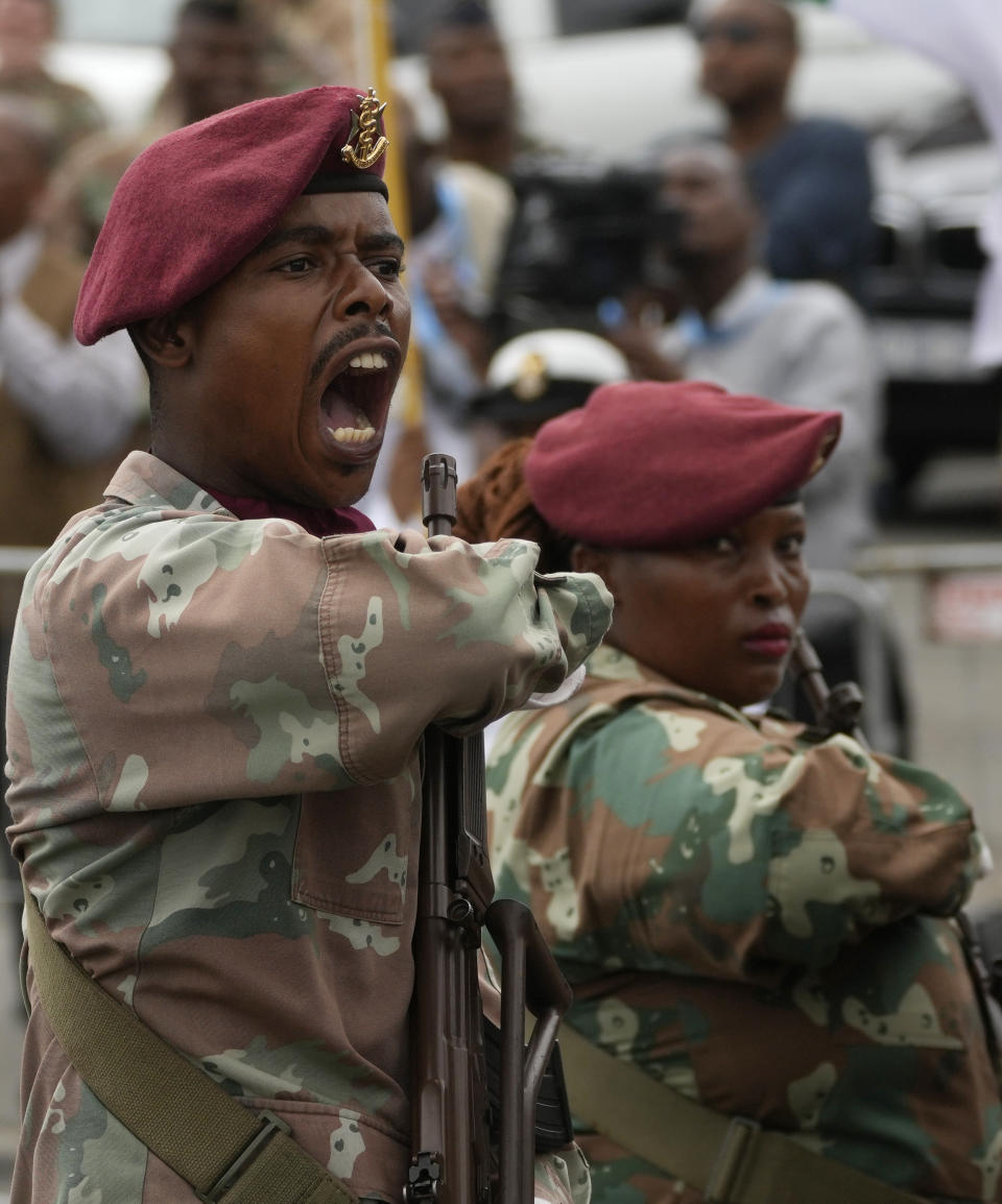 Members of the presidential guard march during the Armed Forces Day in Richards Bay, South Africa, Tuesday, Feb. 21, 2023. The parade took place as a naval exercise was underway off the east coast of the country with Russian and Chinese navies. (AP Photo/Themba Hadebe)