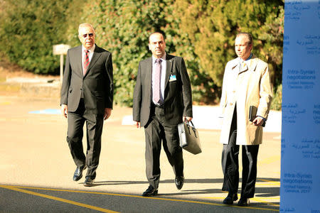 Head of opposition delegation for the Geneva IV conference on Syria Nasr al-Hariri (C) arrives at the United Nations office in Geneva, Switzerland, February 23, 2017. REUTERS/Pierre Albouy