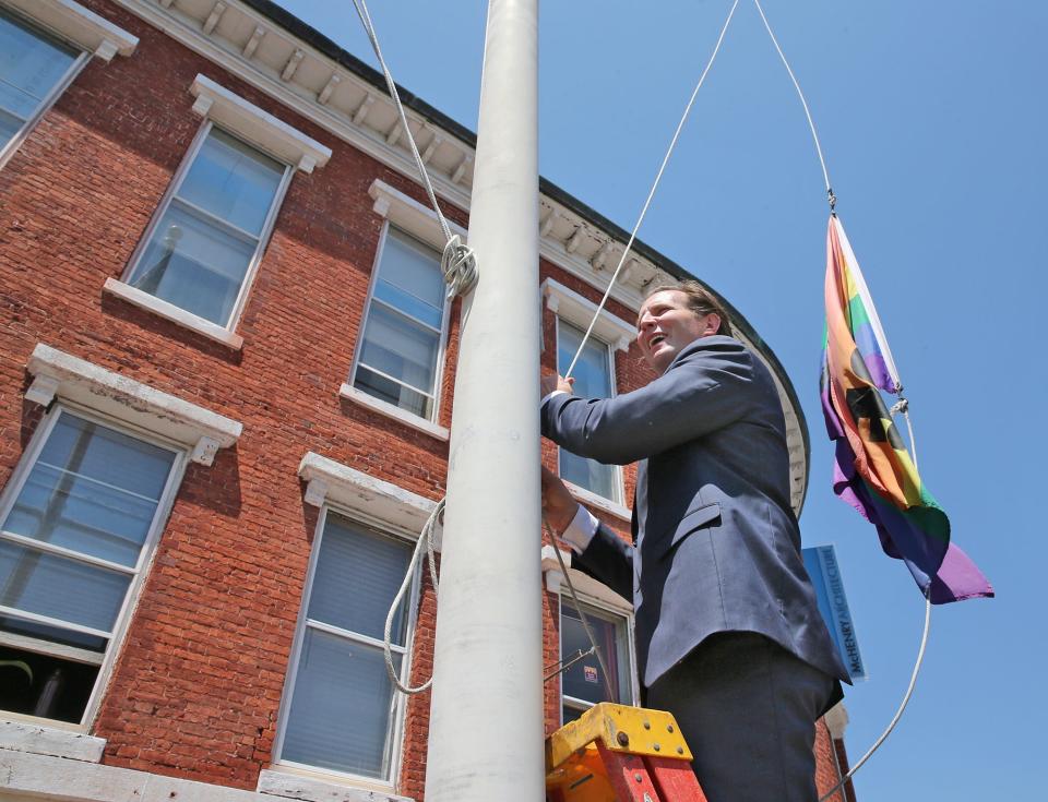 Portsmouth Mayor Deaglan McEachern raises the LGBTQ+ Pride rainbow flag in Market Square June 1, 2023.