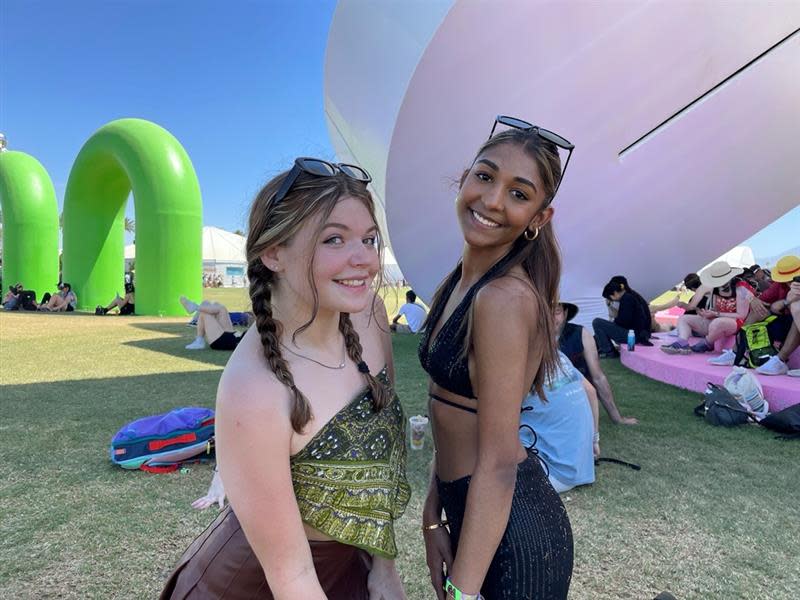 MJ Timilty, left, and Sindhuja Moorthi attend the Coachella Valley Music and Arts Festival on Friday.