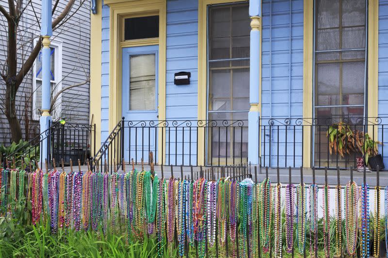 mardi gras mask on fence