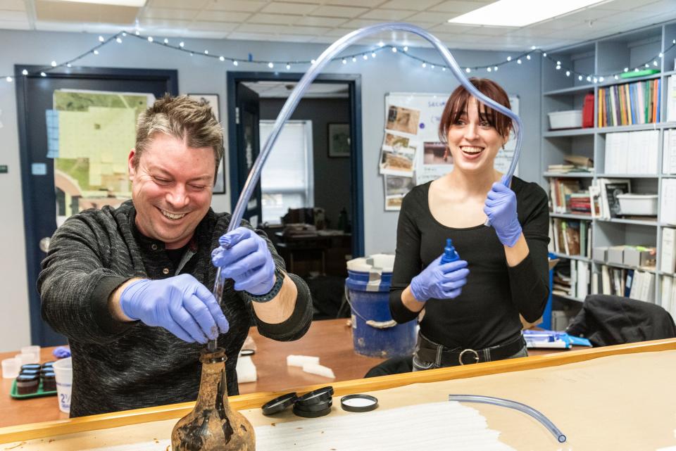 The glass jars were emptied to preserve the glass. They will be sent for conservation, and the liquid contents inside will be sent to a lab for analysis, states a press release from Mount Vernon.