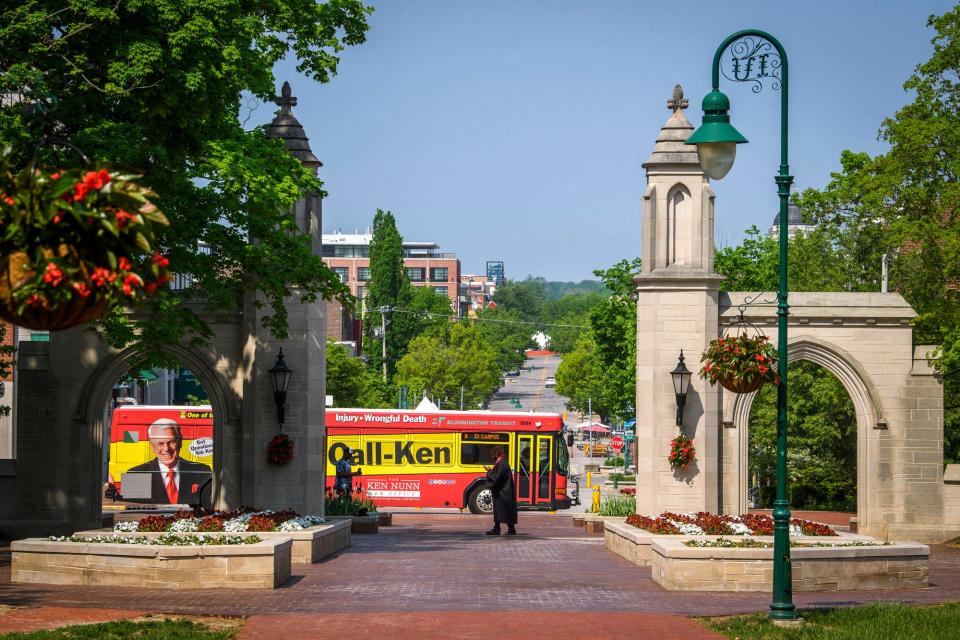 A Bloomington transit bus drives past the Sample Gates on Tuesday, May 17, 2022. 