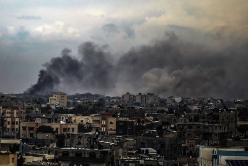 Smoke billows during an Israeli strike in Rafah in the southern Gaza Strip on Sunday. Amid ongoing battles between Israel and the Palestinian fighters, Israel has alleged several UNRWA staff were involved in Hamas's October 7 attack, leading some key donor countries to suspend funding and the agency to fire several staff over the claims, Photo by Ismael Mohamad/UPI