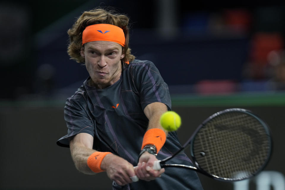 Andrey Rublev of Russia returns a shot to Tommy Paul of the United States during the 4th round of the men's singles match in the Shanghai Masters tennis tournament at Qizhong Forest Sports City Tennis Center in Shanghai, China, Wednesday, Oct. 11, 2023. (AP Photo/Andy Wong)