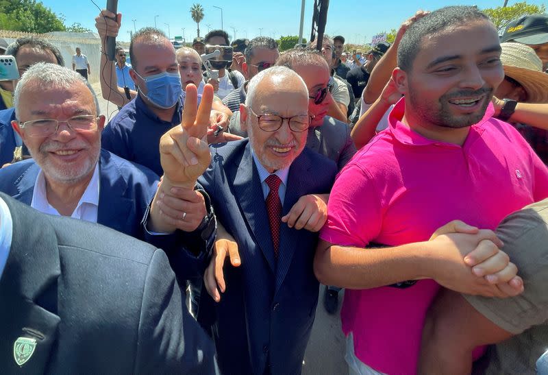 Tunisia's Islamist movement leader Rached Ghannouchi gestures upon arrival at court in Tunis