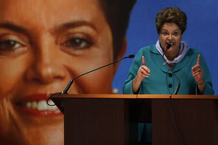 Brazil's President Dilma Rousseff speaks during a meeting with workers of the National Confederation of Agricultural Workers (Contag) in Brasilia August 28, 2014. REUTERS/Ueslei Marcelino