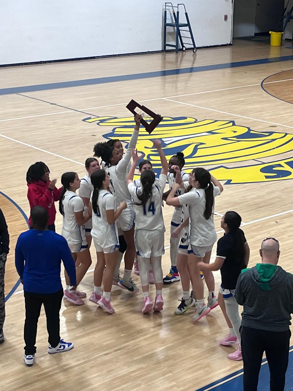 Somerset-Canyons girls basketball celebrates its second straight district championship after a win over North Broward Prep at Pompano Beach High School on Feb. 9, 2024.