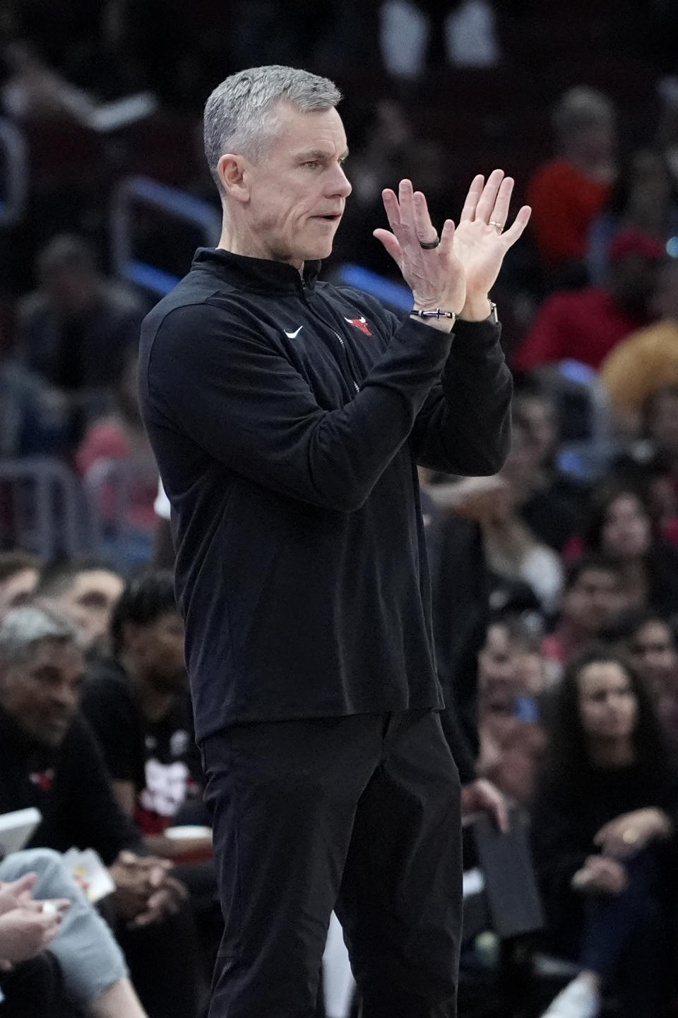 Chicago Bulls coach Billy Donovan gestures during the first half of the team's NBA basketball game against the New York Knicks in Chicago, Tuesday, April 9, 2024. (AP Photo/Nam Y. Huh)