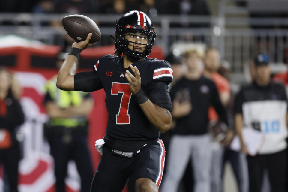 Ohio State quarterback C.J. Stroud looks to throw a pass against Wisconsin during the first half of an NCAA college football game Saturday, Sept. 24, 2022, in Columbus, Ohio. (AP Photo/Jay LaPrete)