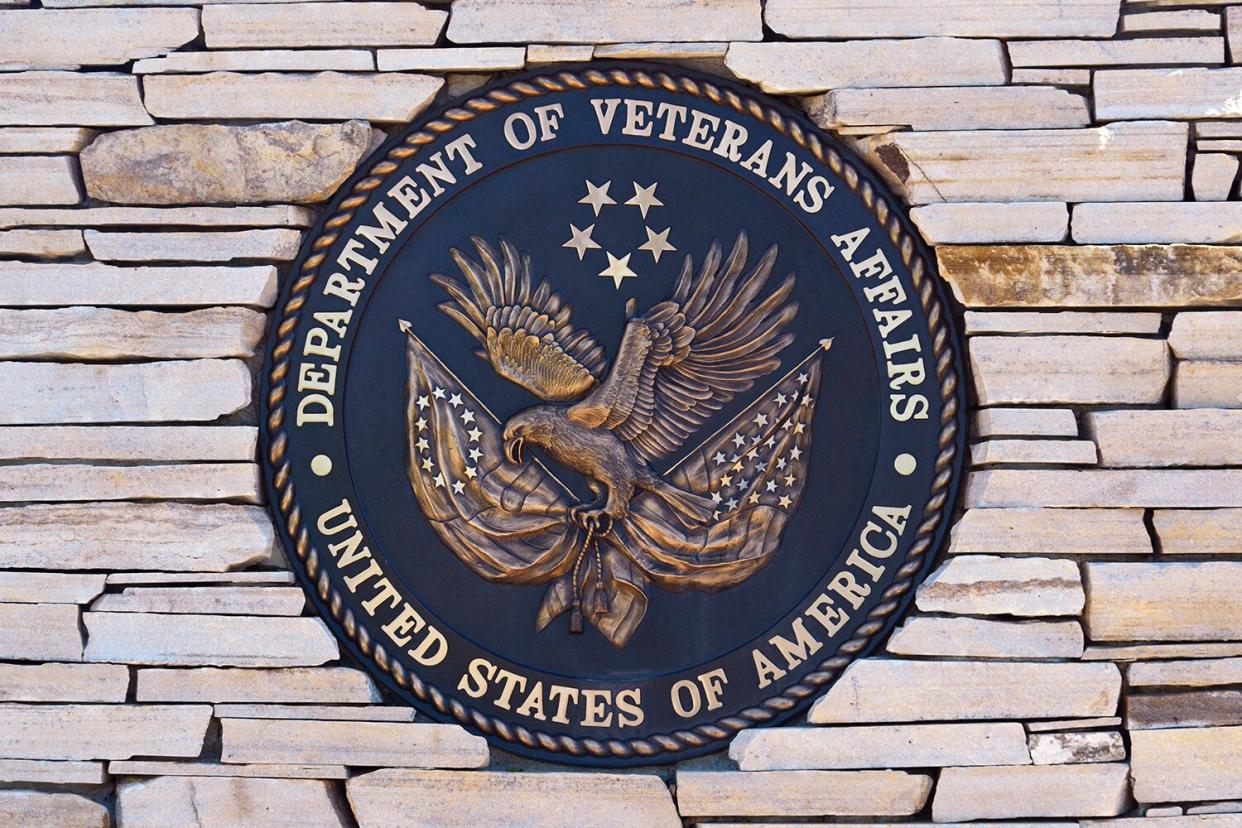 The seal of the United States Department of Veterans Affairs at the entrance to the Santa Fe National Cemetery in Santa Fe, New Mexico.