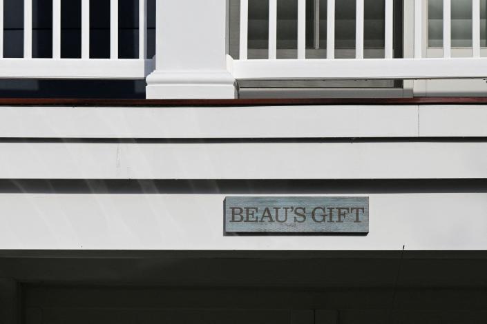 A sign that reads "  Lover's Gift "  Outside of Biden's Rehoboth Beach, Delaware, home