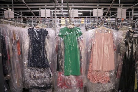 Garments hang at Rent the Runway's "Dream Fulfillment Center" in Secaucus, New Jersey