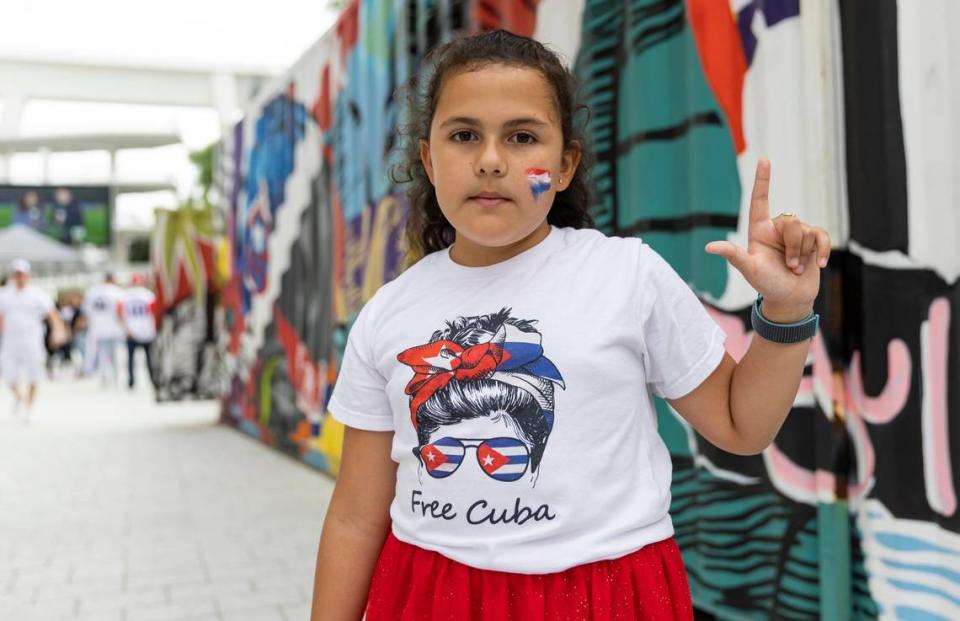 Agnese Reano, 8, is photographed outside of loanDepot Park before the start of the semifinal game between United States and Cuba at the World Baseball Classic on Sunday, March 19, 2023, in Miami, Fla.