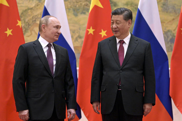 FILE - Chinese President Xi Jinping, right, and Russian President Vladimir Putin talk to each other during their meeting in Beijing, Feb. 4, 2022. China is the only friend that might help Russia blunt the impact of economic sanctions over its invasion of Ukraine, but President Xi Jinping&#x002019;s government is giving no sign it might be willing to risk its own access to U.S. and European markets by doing too much. (Alexei Druzhinin, Sputnik, Kremlin Pool Photo via AP, File)