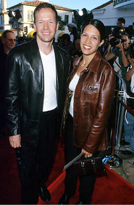 Donnie Wahlberg with his wife at the Mann's Village Theater premiere of Warner Brothers' The Perfect Storm