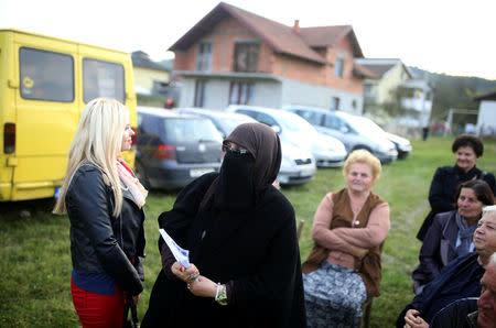 Indira Sinanovic, first Bosnian woman wearing the niqab to run in local election in Bosnia, attends a pre-election rally Zavidovici, Bosnia and Herzegovina, September 27, 2016. REUTERS/Dado Ruvic