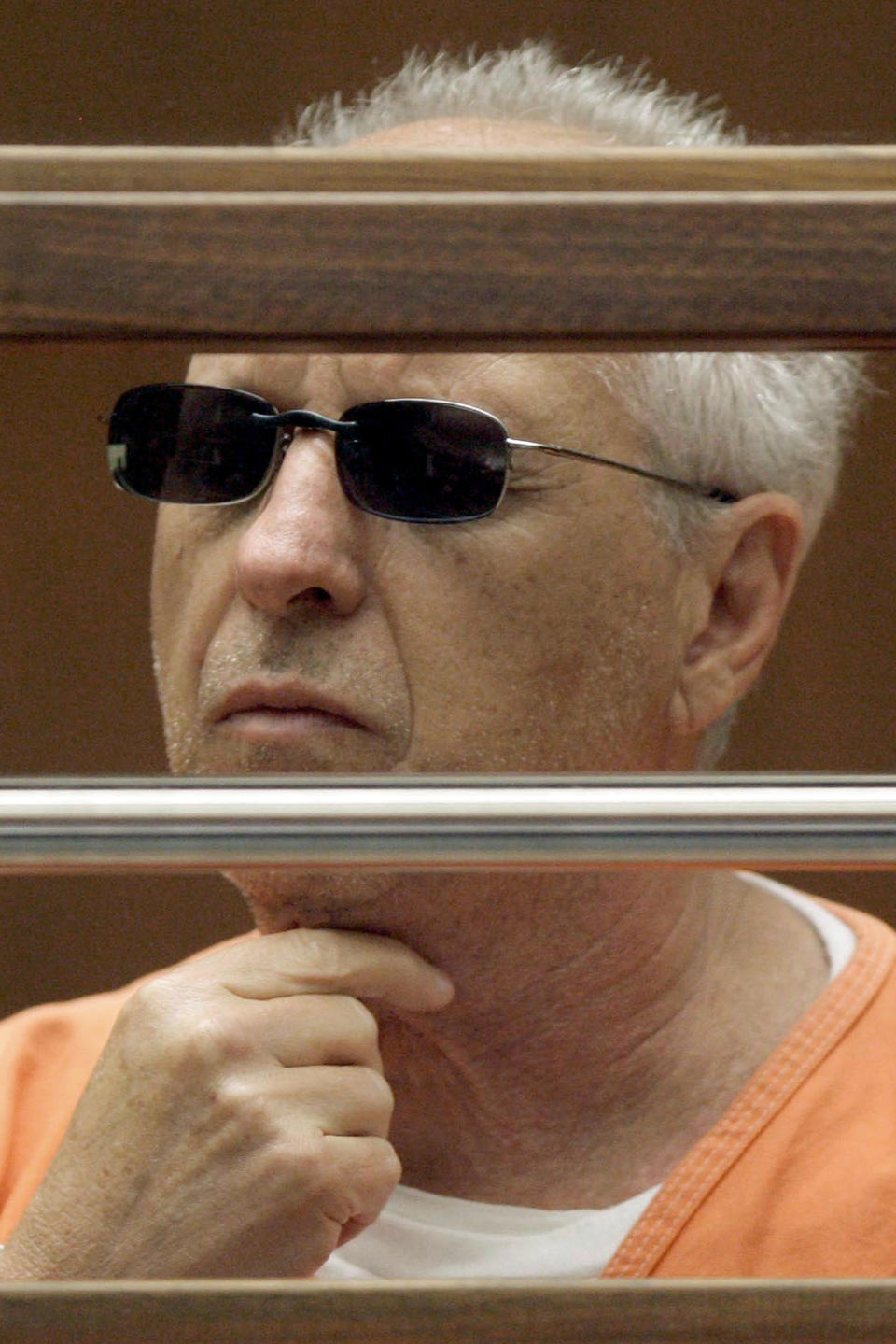 FILE - In this June 19, 2009 file photo, former Hollywood private eye Anthony Pellicano appears in court in Los Angeles. Four years after Pellicano went to prison for wiretapping phones of the rich and famous on behalf of celebrities and Hollywood heavyweights, his clients face hefty bills for his skullduggery. A Los Angeles County jury awarded nearly $4 million in the first of several lawsuits against Pellicano’s well-heeled clients, in finding that the ex-wife of a billionaire philanthropist invaded the privacy of her three adult step-children and a former personal assistant. The verdict could spell trouble for other former clients who have been sued, such as Paramount studio head Brad Grey and one-time superagent Michael Ovitz. (AP Photo/Nick Ut, File)