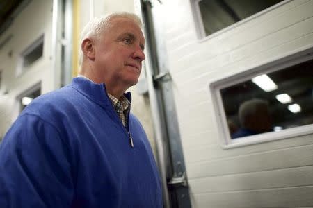 Pennsylvania Governor Tom Corbett leaves after a news conference regarding the capture of Eric Matthew Frein at the Pike County Training Center in Blooming Grove, Pennsylvania October 30, 2014. REUTERS/Mark Makela