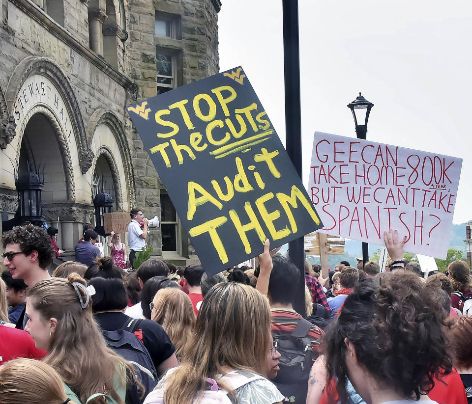 Students gather during a walkout in protest of an administration proposal to cut 9% of majors and amid a $45 million budget shortfall at West Virginia University in Morgantown, W.Va., Monday, Aug. 21, 2023. (Ron Rittenhouse /The Dominion-Post via AP)