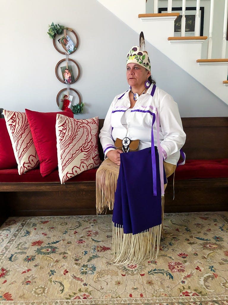 Jessie Little Doe Baird poses in her Wampanoag regalia in her home in Mashpee, Massachusetts, on July 17, 2020. Baird is a linguist best known for her work to revive and teach the Wampanoag language through The Wôpanâak Language Reclamation Project.