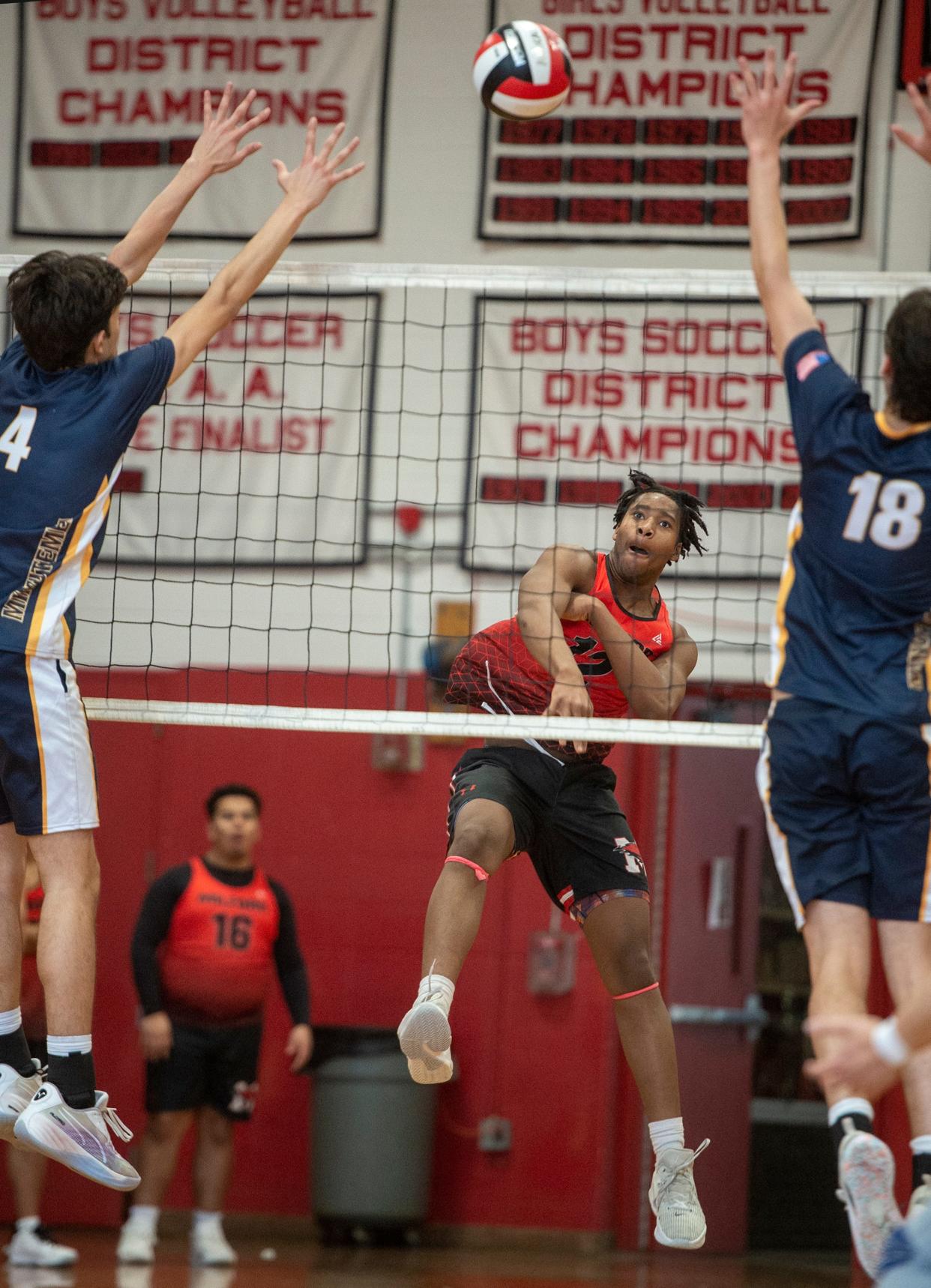 Milford High School boys volleyball senior Ryan Franklin with a spike against Lexington, April 18, 2024.