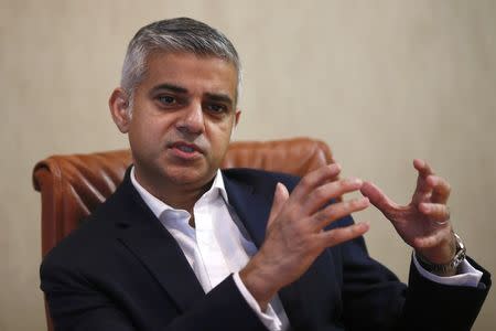 London mayoral candidate Sadiq Khan gestures during an interview with Reuters at Canary Wharf in London, Britain in this file photo dated November 17, 2015. REUTERS/Stefan Wermuth/Files