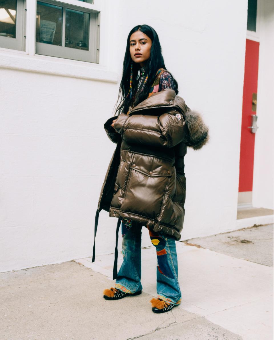 Arpana Rayamajhi strikes a pose in Brooklyn Heights in her <a rel="nofollow noopener" href="https://weallwear.moncler.com/" target="_blank" data-ylk="slk:Moncler Escallonia coat;elm:context_link;itc:0;sec:content-canvas" class="link ">Moncler Escallonia coat</a>, $2,300.