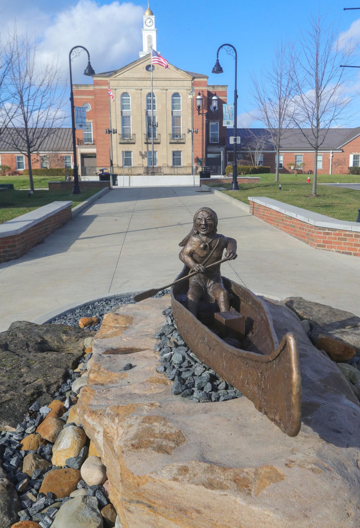 Artist Peter Jones' sculpture titled "River Trade" rests in the walkway leading up to the City Building on Jan. 5 in Cuyahoga Falls.