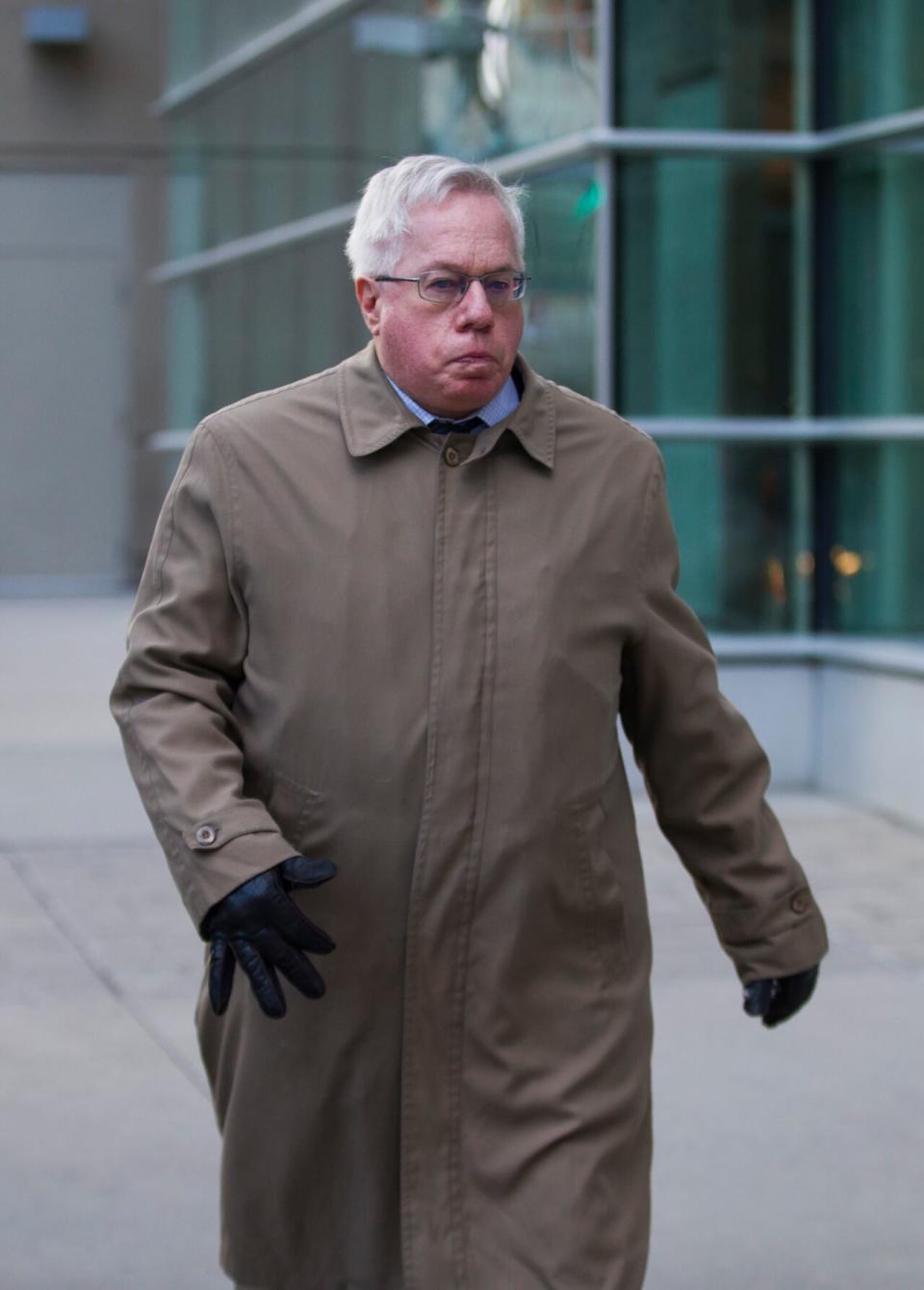 Retired neurologist Keith Hoyte leaves the Calgary courthouse on Jan. 6, 2020. Hoyte admitted in court to sexually assaulting 55 female patients over three decades. (Todd Korol/The Canadian Press - image credit)