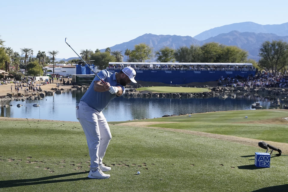 Jon Rahm hits from the 17th tee during the American Express golf tournament on the Pete Dye Stadium Course at PGA West Saturday, Jan. 21, 2023, in La Quinta, Calif. (AP Photo/Mark J. Terrill)