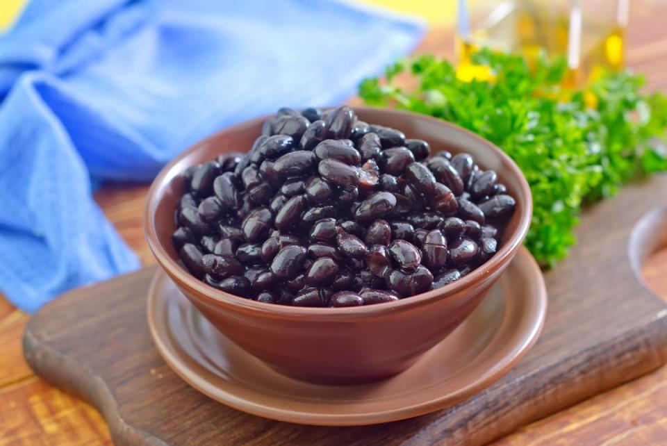 <p>You can always use more protein options that don’t require any cooking, and black beans fit the bill. Keep a few cans in your cupboard so you can drain and rinse when you’re ready to add them to tacos, nachos, and soup. Each ½ cup serving has 7 g of protein, about 100 calories, and 2 milligrams (mg) of iron, making them a good option for vegetarians and vegans.</p><p><strong>Power up your protein: </strong>Spice up the standard black bean with this <a rel="nofollow noopener" href="http://www.sarahaasrdn.com/chipotle-pumpkin-black-bean-burgers/" target="_blank" data-ylk="slk:chipotle pumpkin black bean burger;elm:context_link;itc:0" class="link ">chipotle pumpkin black bean burger</a> from Sara Haas, culinary dietitian.</p>