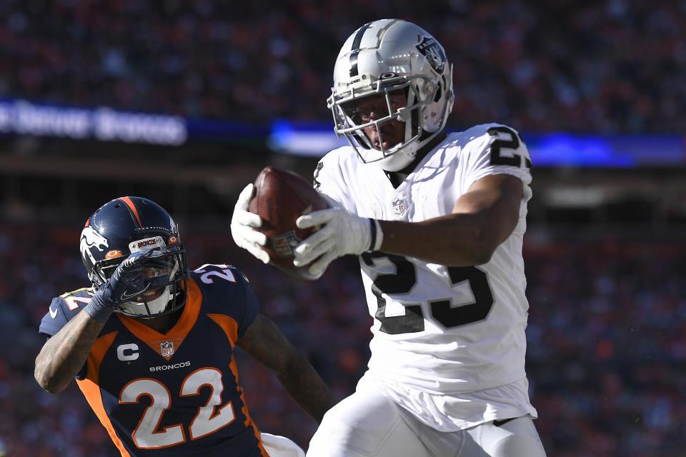 Kenyan Drake scores a touchdown during the Raiders' win over the Broncos. (Photo by Dustin Bradford/Getty Images)