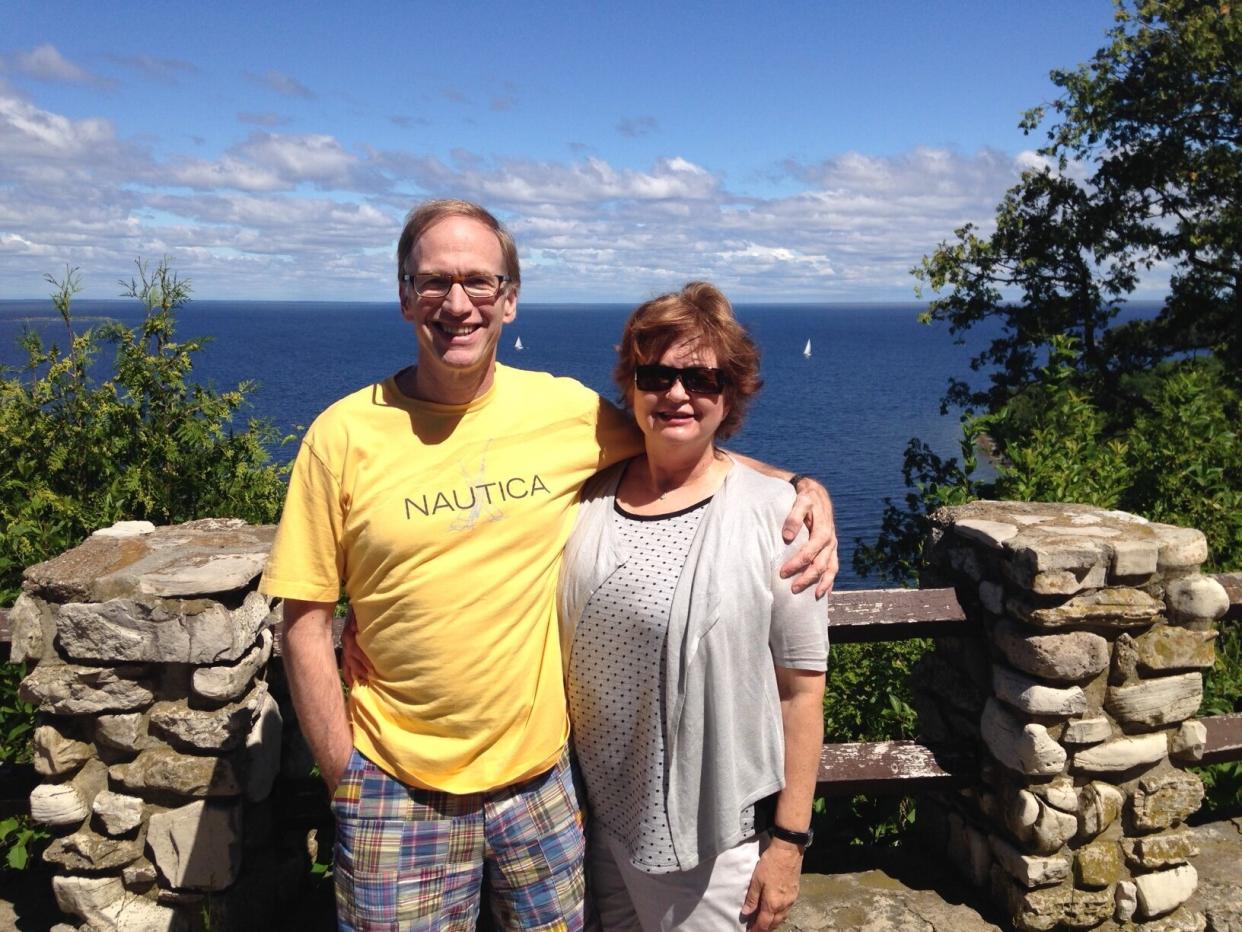 Posing on a scenic Lake Michigan overlook during one of our travel adventures. (Photo: Photo Courtesy Of  Laurie Eynon)