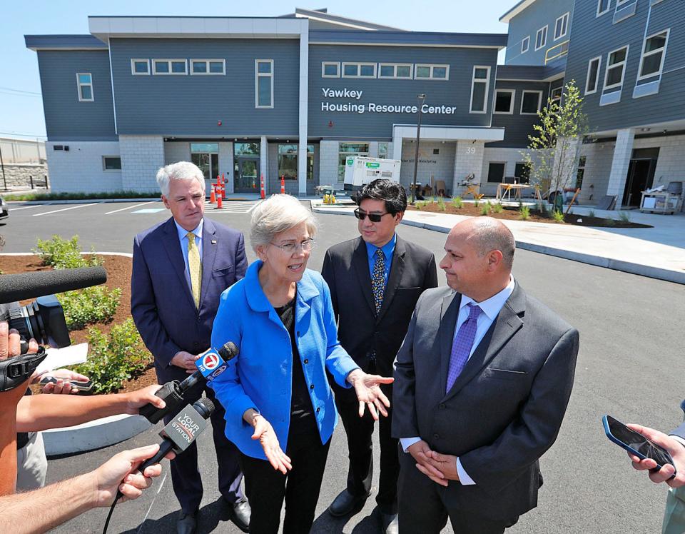 From left, state Sen. John Keenan, U.S. Sen. Elizabeth Warren, state Rep. Tacky Chan and Father Bill's CEO John Yazwinski talk about how to address homelessness and the housing crisis. Warren visited the new Yawkey Housing Resource Center in Quincy on Wednesday, Aug. 2, 2023.