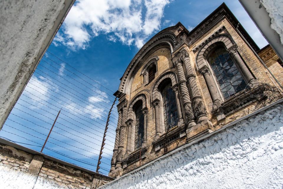 A skyward view of the exterior of Lukiskes Prison