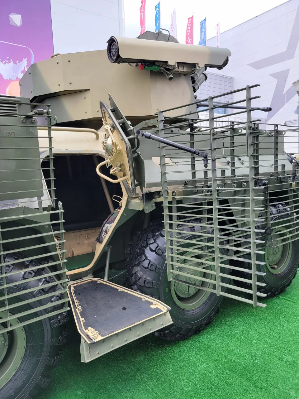 A BTR-82 8x8 armored personnel carrier with slat armor. <em>Michael Jerdev/@MuxelAero</em>