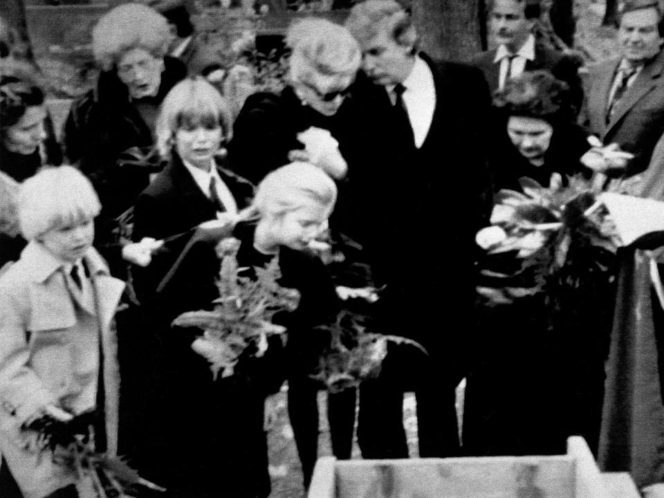 The Trump family at Ivana Trump's father Milos's burial. Eric, 6, is on the left.