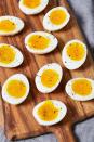 <p>Six minutes is all an egg needs for that perfectly runny yolk. Master <a href="https://www.delish.com/cooking/a22502749/how-to-cook-bacon-in-the-oven-recipe/" rel="nofollow noopener" target="_blank" data-ylk="slk:how to cook crispy bacon;elm:context_link;itc:0;sec:content-canvas" class="link ">how to cook crispy bacon</a> next and your breakfast game is set for life. </p><p>Get the <strong><a href="https://www.delish.com/cooking/recipe-ideas/a29861001/how-to-soft-boil-eggs/" rel="nofollow noopener" target="_blank" data-ylk="slk:Soft Boiled Eggs recipe;elm:context_link;itc:0;sec:content-canvas" class="link ">Soft Boiled Eggs recipe</a>. </strong></p>