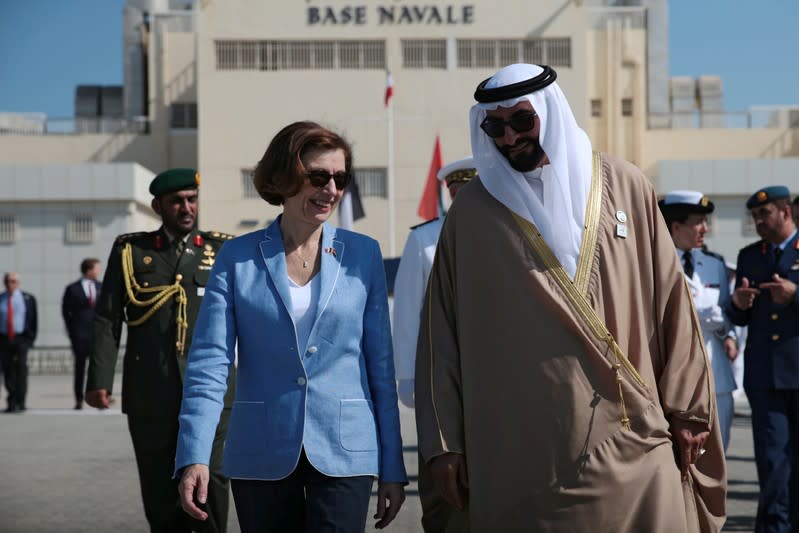 French Defence Minister Florence Parly and United Arab Emirates' Minister of State for Defence Mohammed Bin Ahmad al-Bawardi speak during a military ceremony at the French Naval Base in Abu Dhabi