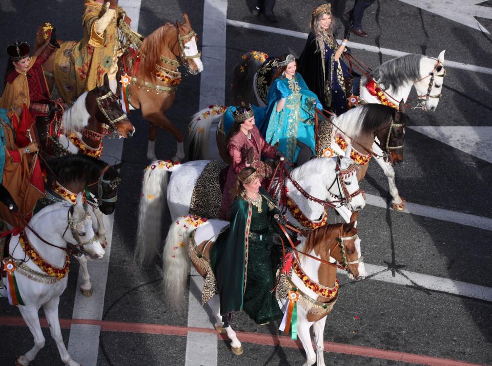 Costumed riders on horseback at the Rose Parade