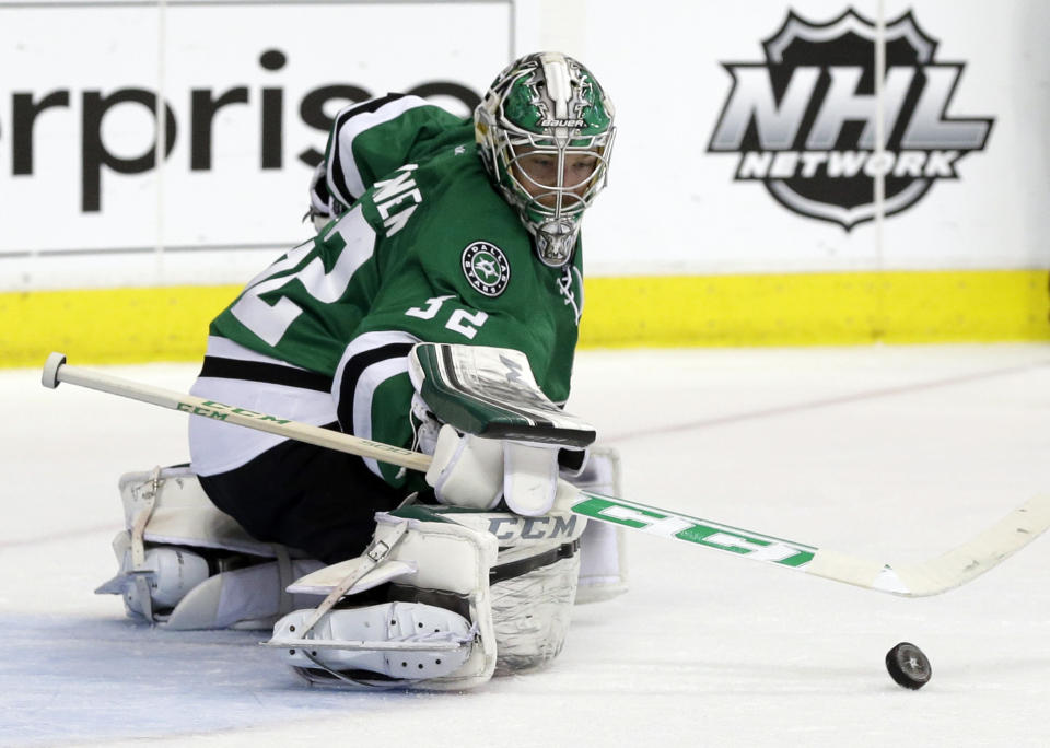 Dallas Stars goalie Kari Lehtonen (32) of Finland defends against a shot by the Anaheim Ducks in the second period of Game 3 of a first-round NHL hockey Stanley Cup playoff series game, Monday, April 21, 2014, in Dallas. (AP Photo/Tony Gutierrez)
